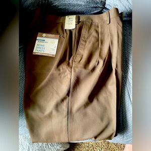 Men’s Haggar pants.  New!